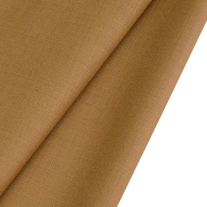 Close-up of Longan raft Worsted Wool Gabardine Fabric By The Yard, a light brown colorful poly wool blended twill with a diagonal weave and smooth, wrinkle-resistant texture—ideal gabardine material for tailored suits.