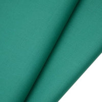 A close-up of two overlapping pieces of Longan raft’s Worsted Wool Gabardine Fabric shows the smooth, teal-colored poly-wool twill texture and fine weave of this durable, wrinkle-resistant material for tailored suits.