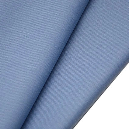 Close-up of two overlapping sheets of Longan raft Worsted Wool Gabardine Fabric in light blue, showing the durable, smooth poly wool blended twill surface and fine, even texture—ideal for tailored suits.