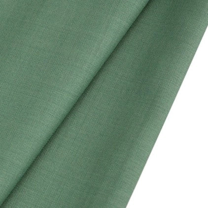 Two pieces of Longan raft Worsted Wool Gabardine Fabric overlap on a white background. This colorful poly wool blended twill material is smooth, slightly textured, wrinkle-resistant, and perfect for durable tailored suits.