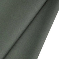 A close-up of Longan raft Worsted Wool Gabardine Fabric by the Yard in dark gray, showing its wrinkle-resistant, smooth poly-wool twill texture and drape on a plain white background. Ideal for durable, tailored suits.