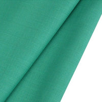 A close-up of Longan raft's Worsted Wool Gabardine Fabric by the yard, a colorful poly wool blended twill gabardine textile, displays its smooth texture and tightly woven, durable material ideal for tailored suits.