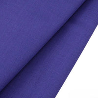 A close-up of two overlapping pieces of Longan raft Worsted Wool Gabardine in deep blue, a smooth, wrinkle-resistant poly wool twill fabric for tailored suits, shown against a white background.
