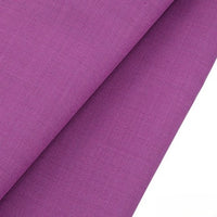 A close-up of Longan raft's Worsted Wool Gabardine Fabric By The Yard shows its smooth, wrinkle-resistant poly wool blend with a subtle twill weave, ideal for durable, tailored suits.