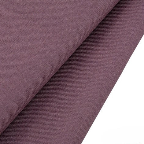 A close-up of Longan raft's Worsted Wool Gabardine Fabric By The Yard shows its purple, wrinkle-resistant poly wool twill, featuring a smooth, slightly textured surface and an even weave—ideal for durable tailored suits.