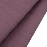 A close-up of Longan raft's Worsted Wool Gabardine Fabric By The Yard shows its purple, wrinkle-resistant poly wool twill, featuring a smooth, slightly textured surface and an even weave—ideal for durable tailored suits.