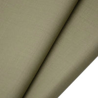 A close-up of Longan raft's Worsted Wool Gabardine Fabric By The Yard in khaki, a colorful poly wool blended twill textile. This durable, wrinkle-resistant gabardine features a smooth, tightly woven matte finish, draped against a white background.