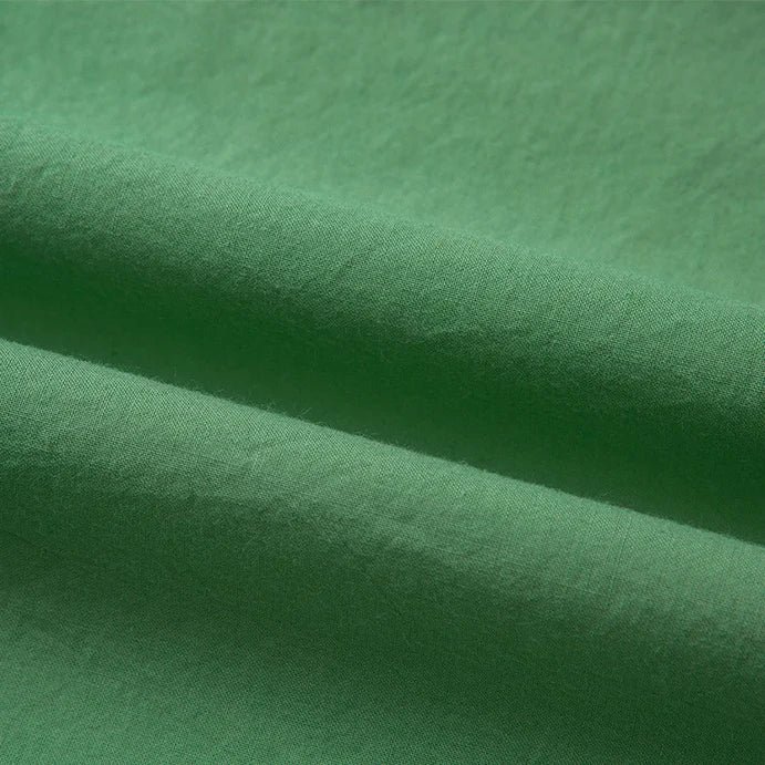 Close-up of Longan Craft’s Woven Lawn Fabric By The Yard, a soft multicolor cotton lawn material with visible texture and gentle folds, ideal as a breathable cotton lawn lining.