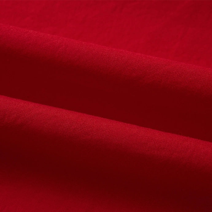 Close-up of Longan Craft’s Woven Lawn Fabric By The Yard, a multicolor cotton lawn material with soft folds and creases that highlight the smooth texture and breathable drape—ideal as a soft cotton lawn lining.