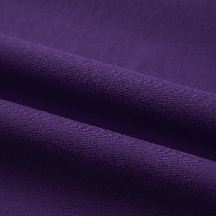 A close-up of Longan Craft's Woven Lawn Fabric By The Yard shows the soft, breathable multicolor cotton lawn material and its smooth texture, ideal for linings and highlighting its vibrant hues.