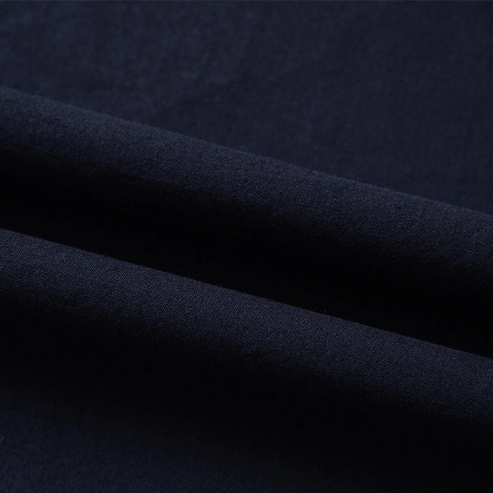Close-up of Longan Craft's Woven Lawn Fabric By The Yard, a multicolor cotton lawn material with a soft, smooth texture and fine weave. This soft cotton lawn lining is ideal for clothing or upholstery.