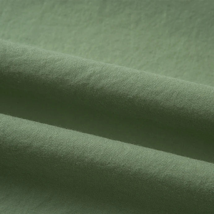 Close-up of Longan Craft’s soft, multicolor cotton lawn fabric by the yard, featuring a slightly textured, breathable surface with gentle folds and subtle shadows—ideal as a lining or for lightweight projects.