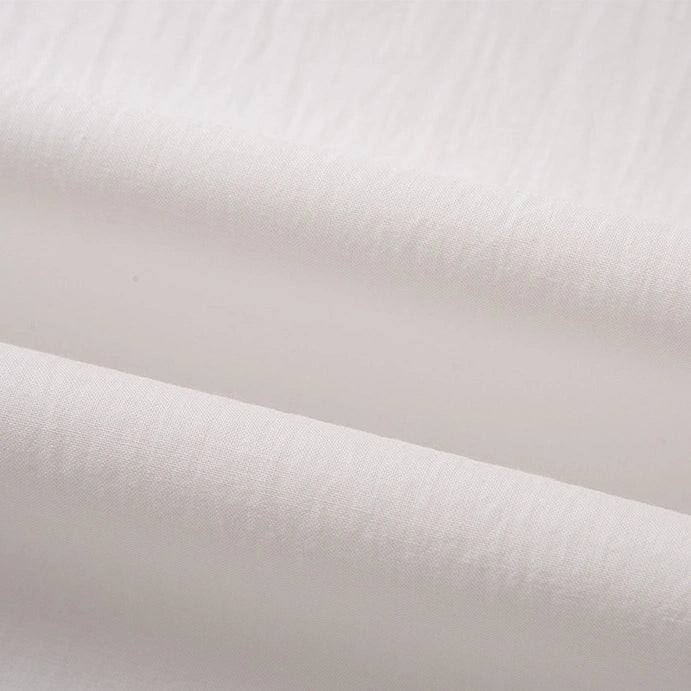 Close-up of Longan Craft’s Woven Lawn Fabric By The Yard—Multicolor Cotton Lawn Material—showing its soft, breathable, and lightweight texture with gentle folds and a clean finish ideal for lining.