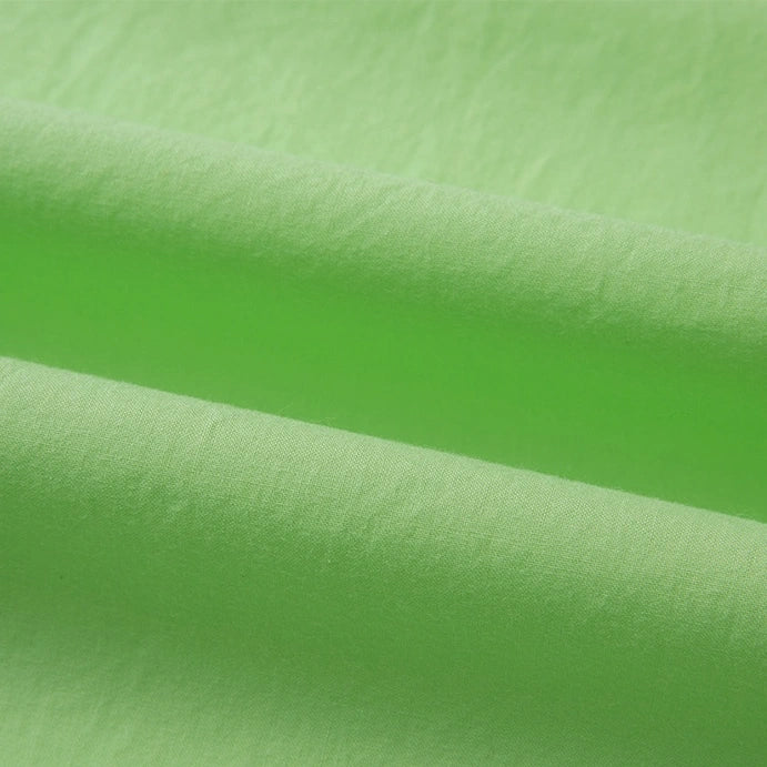 Close-up of Longan Craft's Woven Lawn Fabric by the Yard, a soft, breathable multicolor cotton lawn material with a slightly textured surface and gentle folds—ideal as lining.