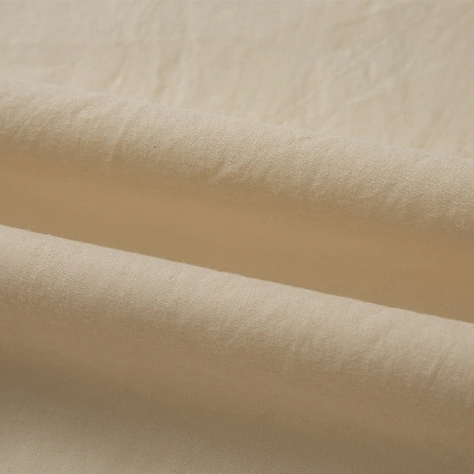 Close-up of Longan Craft's Woven Lawn Fabric By The Yard showcases its soft, multicolor cotton lawn material with gentle folds and a smooth, matte finish—perfect as a lining or for crafts.
