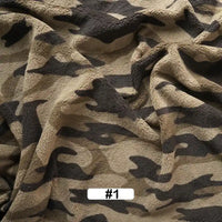 A close-up of Longon Craft's Christmas Polar Fleece Fabric by the yard, a thick, double-sided polyester fleece with a printed pattern. A white label at the bottom center displays “#1” in black text.
