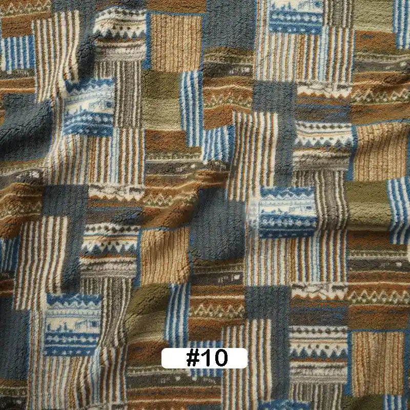 Longon Craft's Christmas Polar Fleece Fabric by the yard features a blue, brown, olive, and cream patchwork with stripes, zigzags, and geometric patterns. This thick, double-sided polyester material is perfect for holiday sewing projects.