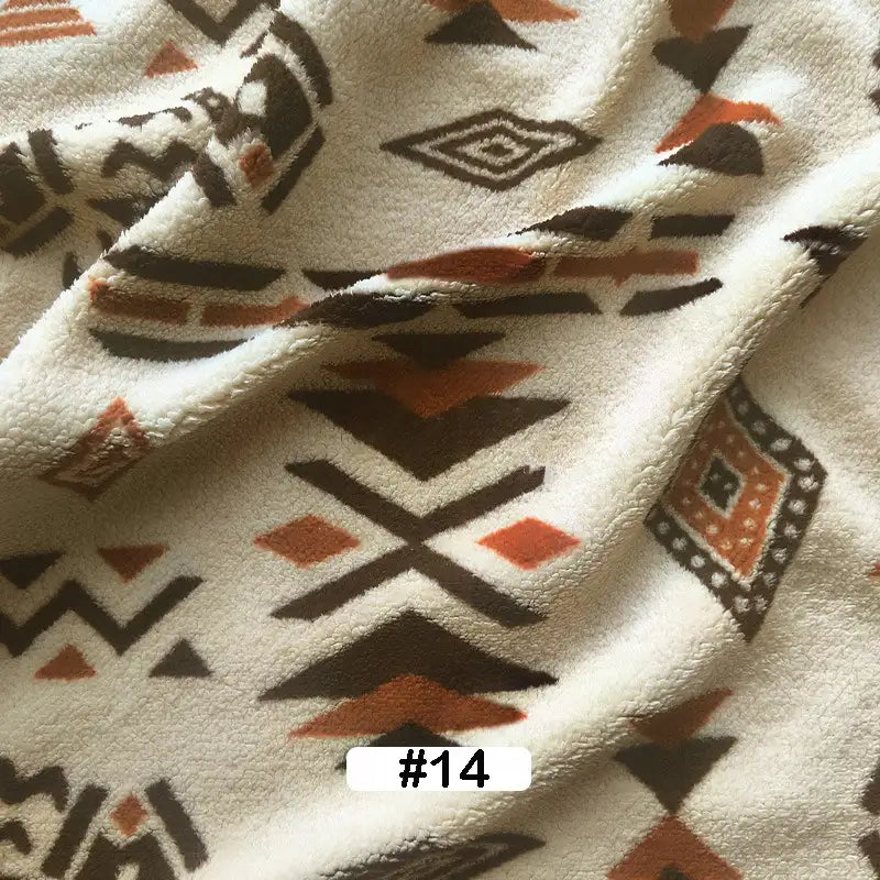 The Longon Craft Christmas Polar Fleece Fabric By The Yard is a cream-colored, thick polyester material with brown, black, and rust geometric tribal prints. This double-sided fleece is shown folded with a #14 label at the bottom center.