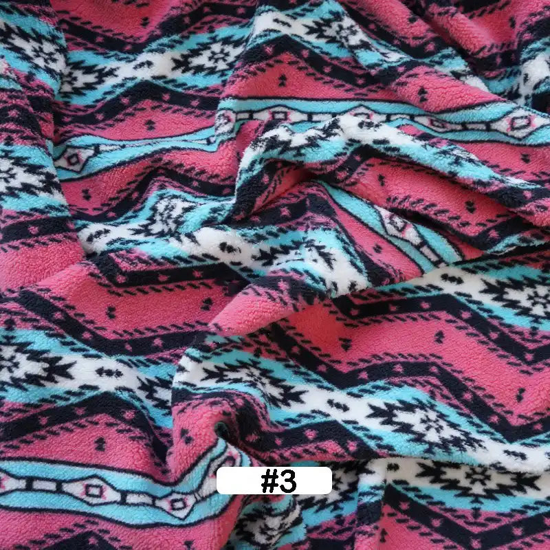 Longon Craft's Christmas Polar Fleece Fabric By The Yard features a soft, double-sided geometric print in pink, black, turquoise, and white with zigzags and diamonds—perfect for holiday projects. "#3" label shown at the bottom center. Polyester, thick, durable.