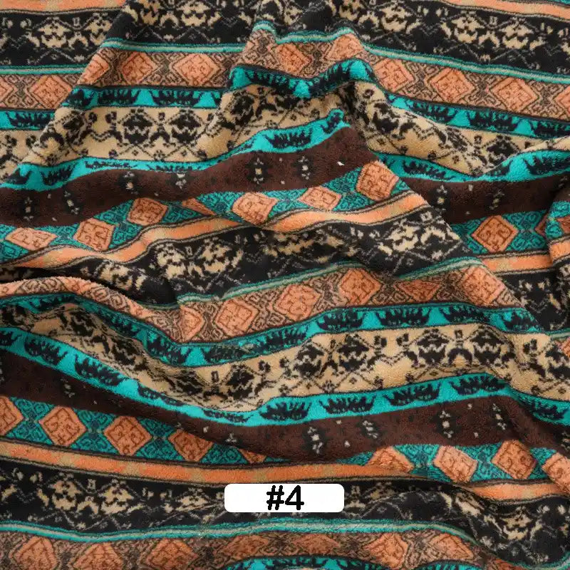 A slightly wrinkled yard of Longon Craft Christmas Polar Fleece Fabric, printed double-sided with horizontal black, teal, brown, tan, and orange geometric and tribal patterns. Label #4 appears at the bottom center.
