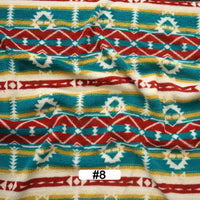 Longon Craft’s Christmas Polar Fleece Fabric by the yard features a festive geometric pattern in red, teal, yellow, and white. This double-sided polyester fleece is thick and perfect for holiday sewing projects (#8 label at bottom center).