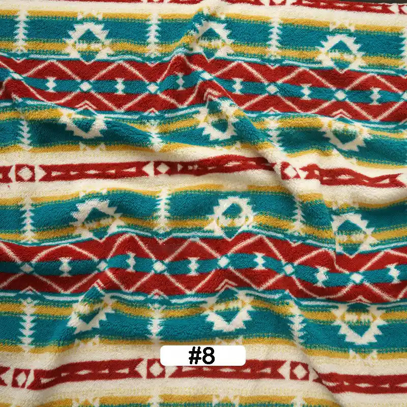 Longon Craft’s Christmas Polar Fleece Fabric by the yard features a festive geometric pattern in red, teal, yellow, and white. This double-sided polyester fleece is thick and perfect for holiday sewing projects (#8 label at bottom center).