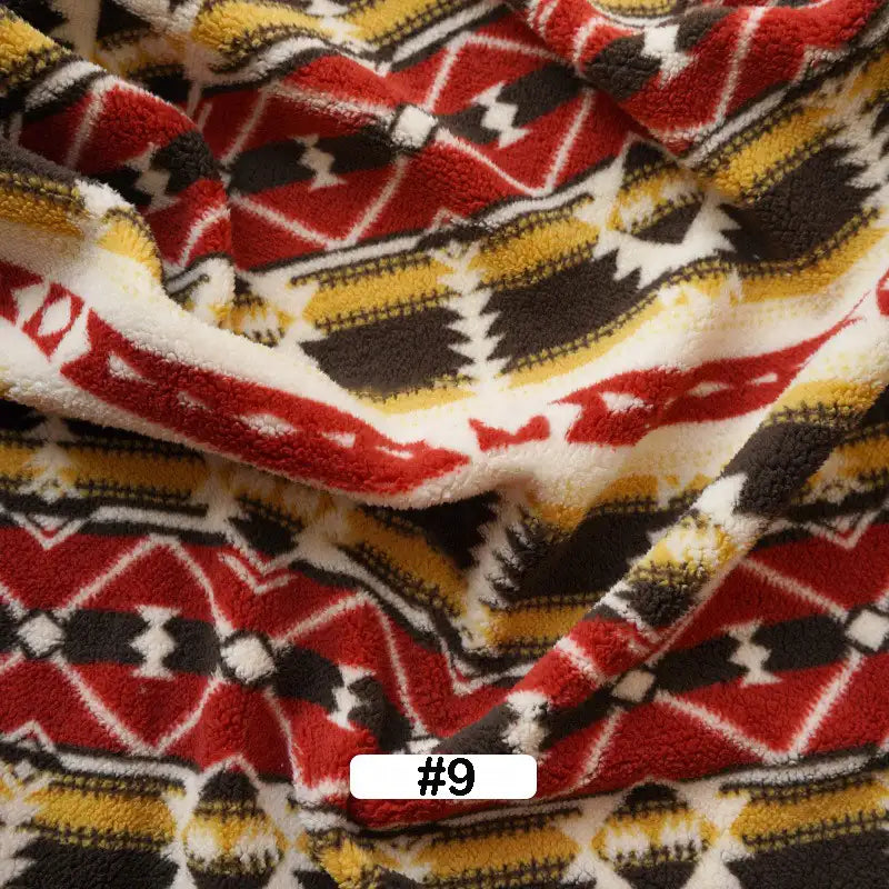 Longon Craft’s Christmas Polar Fleece Fabric by the Yard features bold red, yellow, black, and white geometric zigzags and diamonds. This thick, double-sided polyester fleece is festive for holiday sewing. A white label at the bottom center displays #9 in black text.