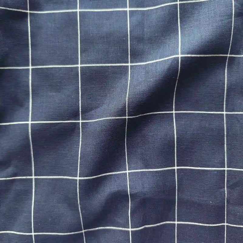 Navy blue fabric with white grid pattern