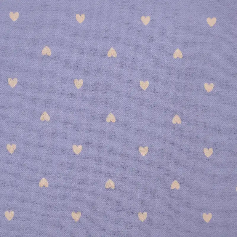 Pattern of small hearts on a textured blue background