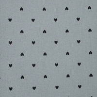 Pattern of black hearts on a gray background