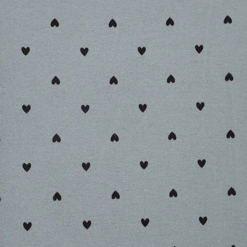 Pattern of black hearts on a gray background