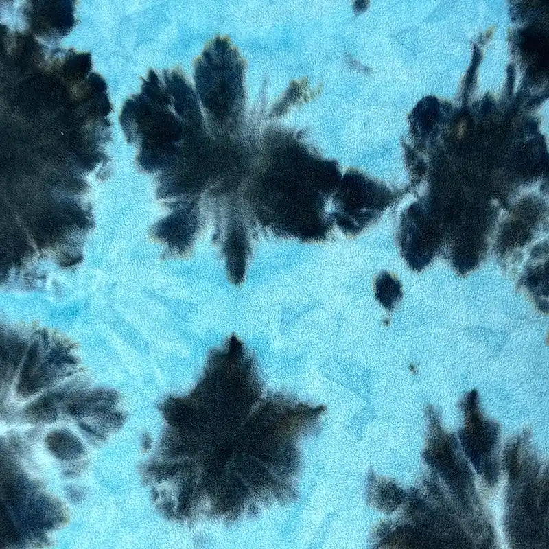 Longon Craft Double Sided Polar Fleece Fabric by the yard features blue and black tie-dye watercolor starburst patterns on a soft, thick polyester fleece—ideal for clothing and sewing projects.