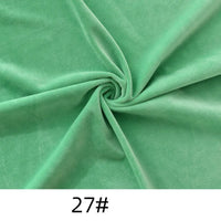 Longon Craft Minky Fabric by the yard in solid green, thick cuddle texture, twisted at the center. Number 27# shown below. Ideal for plushies, crafts, and upholstery.