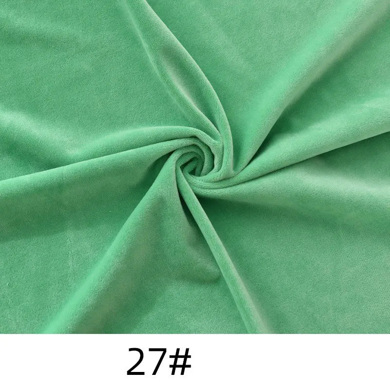 Longon Craft Minky Fabric by the yard in solid green, thick cuddle texture, twisted at the center. Number 27# shown below. Ideal for plushies, crafts, and upholstery.