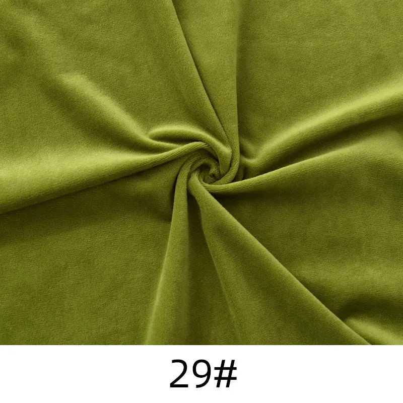 Olive green Longon Craft Minky Fabric By The Yard—solid color, thick cuddle plush polyester for sewing, upholstery, and crafts—is shown in a swirl pattern with the "29#" label at the bottom.