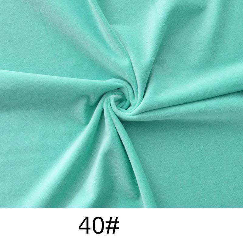 A swirl of light turquoise Longon Craft Minky Fabric By The Yard, a thick plush polyester for dolls and crafts, is shown with the number "40#" at the bottom.