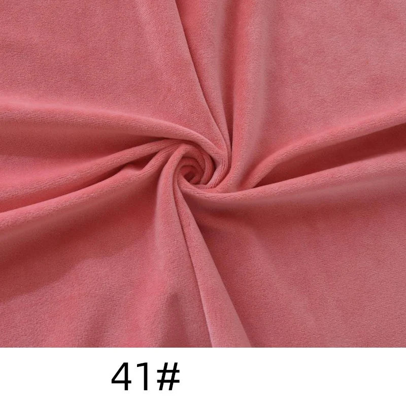 Longon Craft's Solid Color Thick Cuddle Minky Fabric, in plush pink polyester, is shown in a spiral twist to highlight its soft texture and drape. The number "41#" is displayed at the bottom of the image.