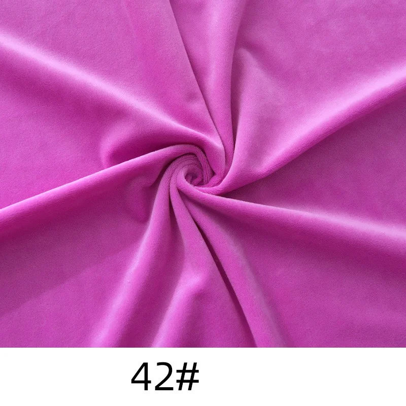 A piece of vibrant purple Solid Color Thick Cuddle Minky Fabric from Longon Craft is twisted at the center, with "42#" shown at the bottom.