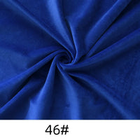 A piece of thick royal blue cuddle minky fabric by Longon Craft is shown swirled at the center, labeled "46#", ideal for soft dolls, plushies, crafts, and upholstery.