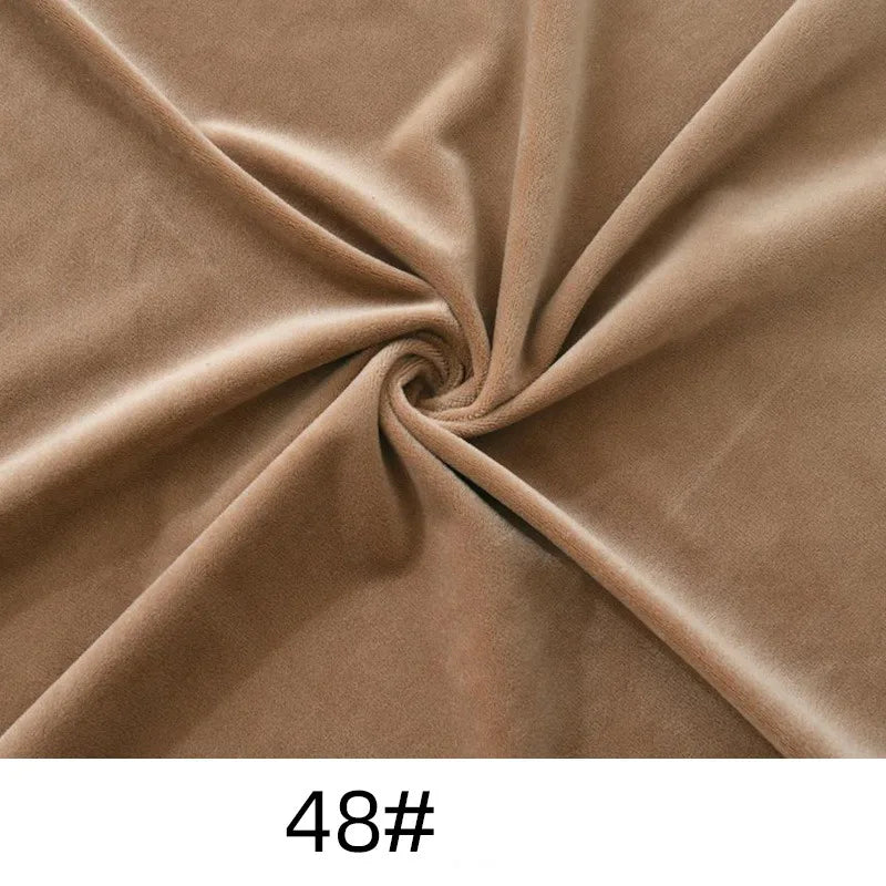 A spiral of light brown Longon Craft Minky Fabric By The Yard, a thick, solid color cuddle minky perfect for plushies, crafts, and upholstery, with the label "48#" at the bottom.