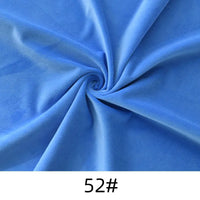 A piece of Longon Craft Minky Fabric By The Yard in light blue is twisted at the center, with "52#" shown below, highlighting this soft, thick solid color cuddle minky ideal for plushies, sewing, crafts, or upholstery.