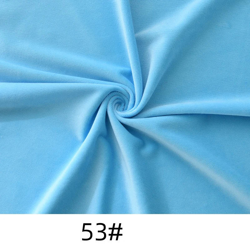 Light blue Minky Fabric By The Yard from Longon Craft, made of thick plush polyester in a spiral pattern, perfect for soft dolls, plushies, and upholstery. Solid color shown with “53#” at the bottom of the image.