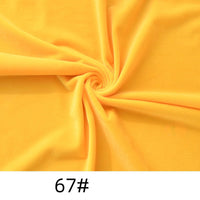 A swirl of bright yellow Longon Craft Minky Fabric By The Yard, a thick, soft polyester microfiber for plushies and crafts, is shown with "67#" marked at the bottom.