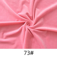 A swirl of soft pink Minky Fabric By The Yard from Longon Craft is shown, labeled "73#" on a white background. Ideal for plushies, dolls, and upholstery projects.