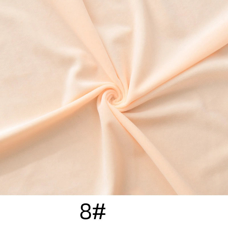 A swirl of soft, light peach Minky fabric from Longon Craft is showcased, highlighting its smooth, plush texture; the label "8#" appears at the bottom. Ideal for dolls, plushies, crafts, sewing, and upholstery.