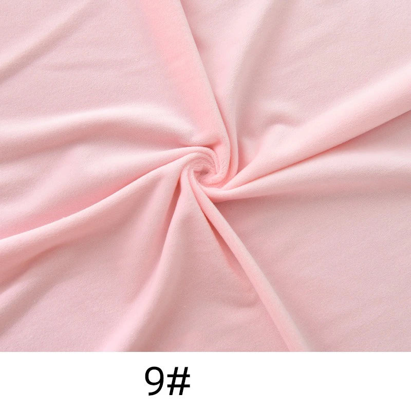 Longon Craft’s Minky Fabric By The Yard features light pink plush polyester arranged in a spiral twist pattern, perfect for soft dolls, plushies, and sewing projects. Displayed sample is labeled "9#".
