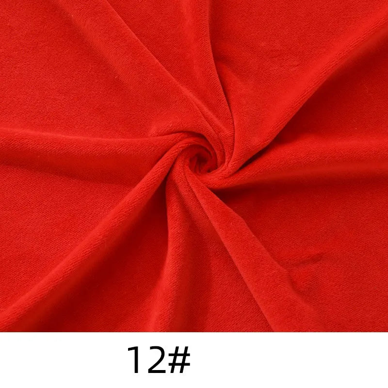 Close-up of bright red Minky Fabric By The Yard from Longon Craft, featuring plush polyester in a swirl pattern. Label "12#" appears at the bottom. Ideal for plushies, crafts, sewing, and upholstery projects.