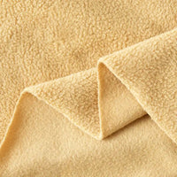Close-up of Longon Craft’s Plain Polar Fleece Fabric by the yard, a thick, anti-pill polyester material with a soft, textured surface and smooth underside—ideal for cozy jackets, blankets, and stretch sewing projects.