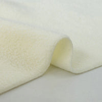 Close-up of Longon Craft's Plain Polar Fleece Fabric By The Yard—thick, anti-pill polyester fleece with a soft, fluffy texture—shown folded on a smooth white background. Perfect stretch material for sewing jackets and outdoor wear.