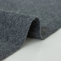 A close-up of Longon Craft Plain Polar Fleece Fabric by the Yard shows the thick, soft, anti-pill polyester's textured surface and curled edge on a light background—ideal for stretch sewing projects.